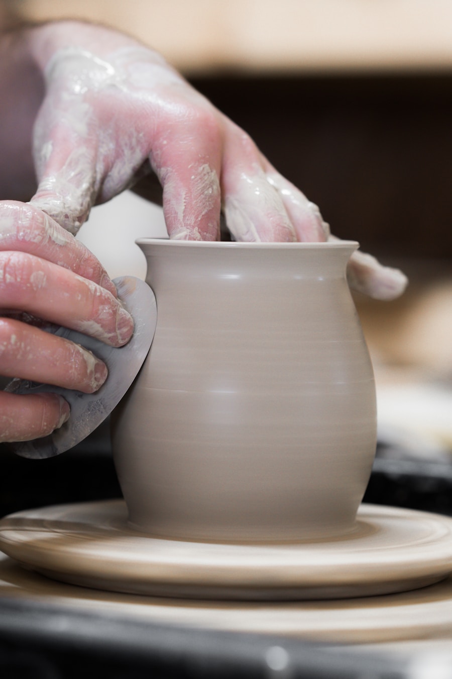 Artisan shaping clay